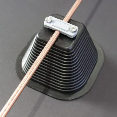 Concrete pedestal with pyramidal plastic envelope with fixing clip for conductor 30x2mm