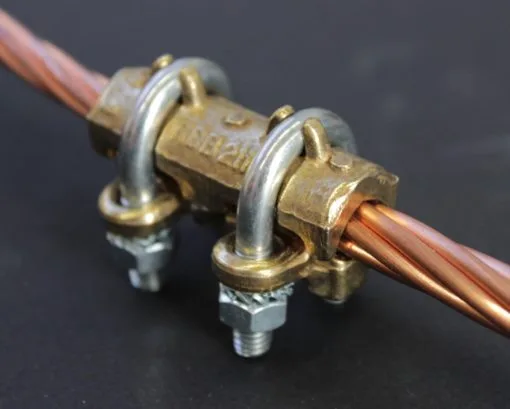 Straight brass connector for conductor from 10 to 70mm², steel brackets