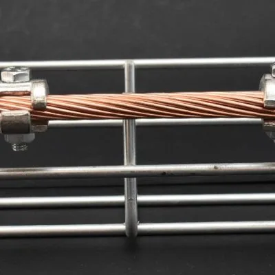 With stainless steel screws